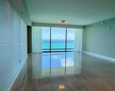 10203 Collins Ave - Photo Thumbnail 3