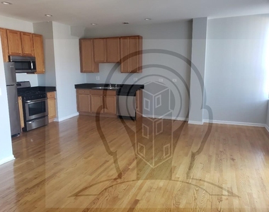 2451 W Howard St - Photo Thumbnail 2