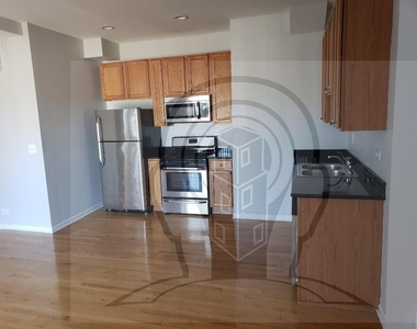 2451 W Howard St - Photo Thumbnail 4