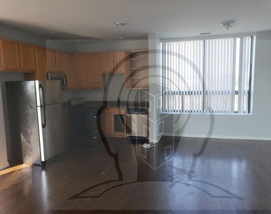 2451 W Howard St - Photo Thumbnail 4