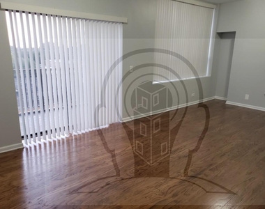 2451 W Howard St - Photo Thumbnail 2