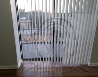 2451 W Howard St - Photo Thumbnail 3