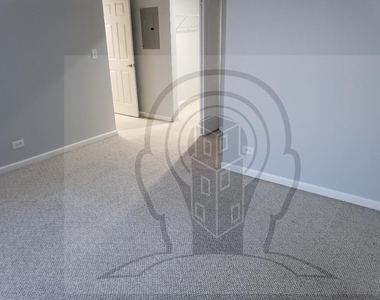 2451 W Howard St - Photo Thumbnail 3