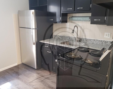 6021 N Winthrop Ave - Photo Thumbnail 1