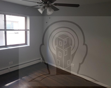 6021 N Winthrop Ave - Photo Thumbnail 4