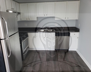 2451 W Howard St - Photo Thumbnail 4