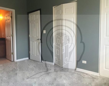 2451 W Howard St - Photo Thumbnail 4