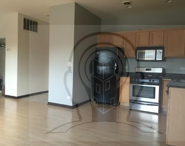 2451 W Howard St - Photo Thumbnail 1