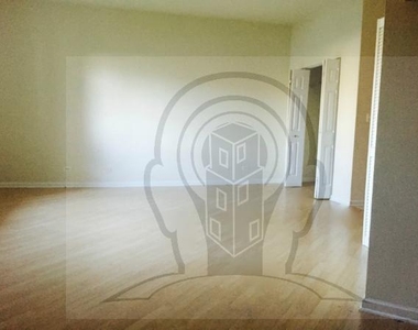 2451 W Howard St - Photo Thumbnail 3