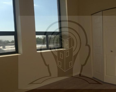 2451 W Howard St - Photo Thumbnail 4