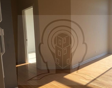 2451 W Howard St - Photo Thumbnail 1