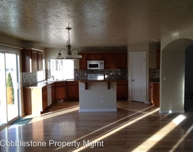 3693 South Brigham Ave - Photo Thumbnail 5