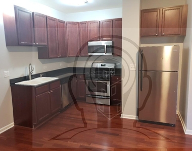 2451 W Howard St - Photo Thumbnail 2