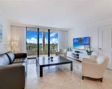 9801 Collins Ave - Photo Thumbnail 2