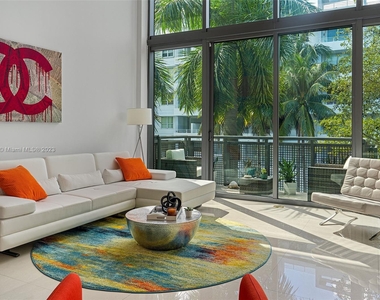 6000 Collins Ave - Photo Thumbnail 1