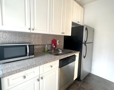 99-21 67th Rd - Photo Thumbnail 4