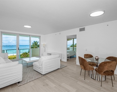 9499 Collins Ave - Photo Thumbnail 2