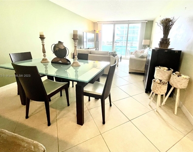 6917 Collins Ave - Photo Thumbnail 1