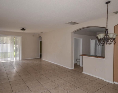 10313 Avelar Ridge Drive - Photo Thumbnail 2