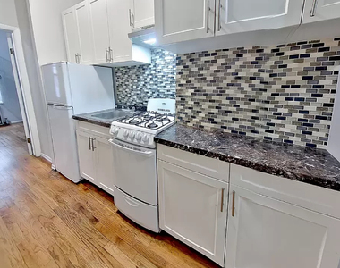 218 East 6th Street - Photo Thumbnail 2