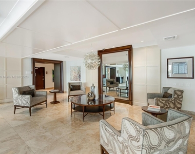 9499 Collins Ave - Photo Thumbnail 2