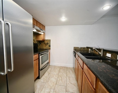 4425 Travis Street - Photo Thumbnail 1