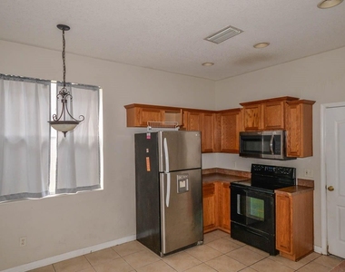 10313 Avelar Ridge Drive - Photo Thumbnail 3