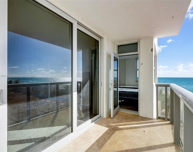 6039 Collins Ave - Photo Thumbnail 1