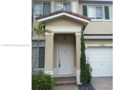 11245 Nw 57th Ln - Photo Thumbnail 0