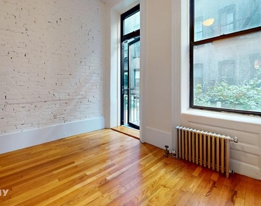 229 E 12th St - Photo Thumbnail 5