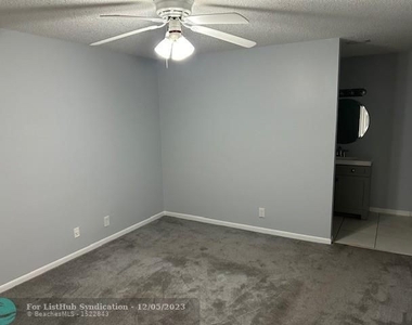 3323 Cocoplum Cir - Photo Thumbnail 11