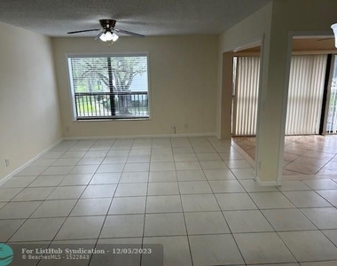 3323 Cocoplum Cir - Photo Thumbnail 3