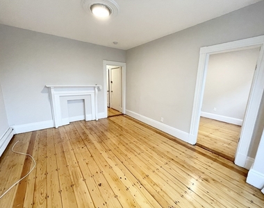 1574 Tremont Street - Photo Thumbnail 2