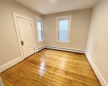 1574 Tremont Street - Photo Thumbnail 4