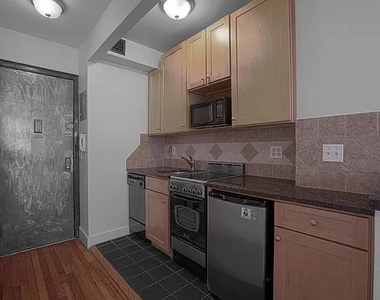 208 West 23rd Street - Photo Thumbnail 1