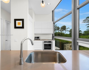 5875 Collins Ave - Photo Thumbnail 3