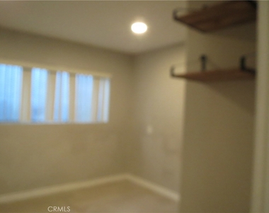 12203 Menlo Avenue - Photo Thumbnail 2