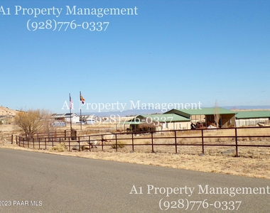 11211 N Cowboy Trail - Photo Thumbnail 2