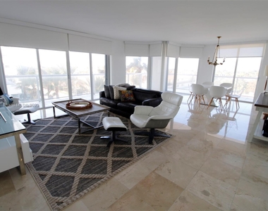 8925 Collins Ave - Photo Thumbnail 1