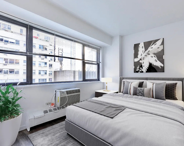 E 39th St - Photo Thumbnail 4