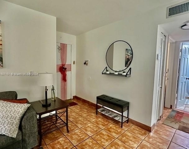 9410 Live Oak Pl - Photo Thumbnail 6