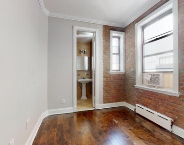 214 East 25th Street - Photo Thumbnail 4