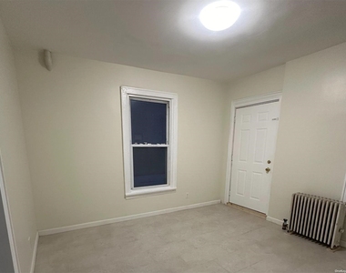 212-26 Jamaica Ave - Photo Thumbnail 1