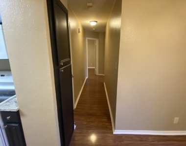 4847 Brandeis St - Photo Thumbnail 2