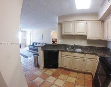 1280 S Alhambra Cir - Photo Thumbnail 3