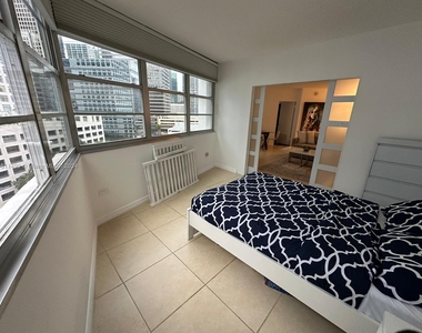 825 Brickell Bay Dr - Photo Thumbnail 3