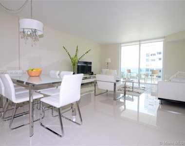 10275 Collins Ave - Photo Thumbnail 2