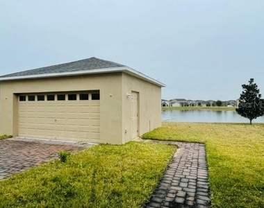 6013 Sunset Isle Drive - Photo Thumbnail 37