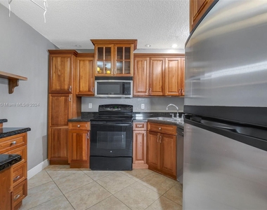 3763 Cocoplum Cir - Photo Thumbnail 13