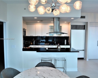 6899 Collins Ave - Photo Thumbnail 1